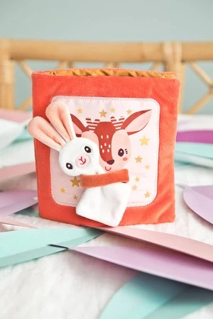 LILLIPUTIENS Miękka książeczka aktywizująca z mini-komforterem „Stella i jej przytulanka” 12 m+