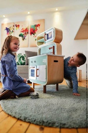 Janod Dwustronna drewniana kuchnia z pralką 2w1, z dźwiękiem, światłem LED i 8 akcesoriami